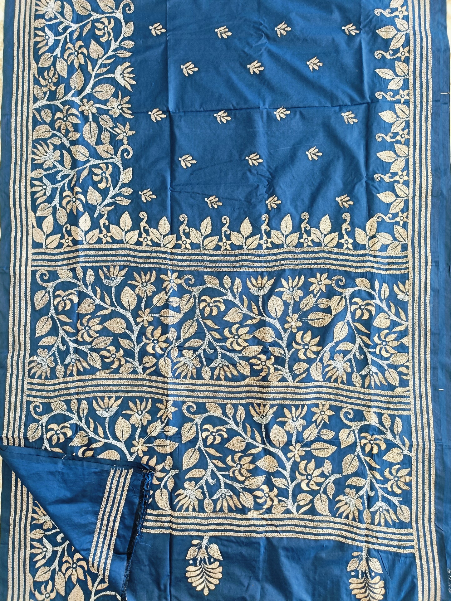 Blue fabric with white floral patterns