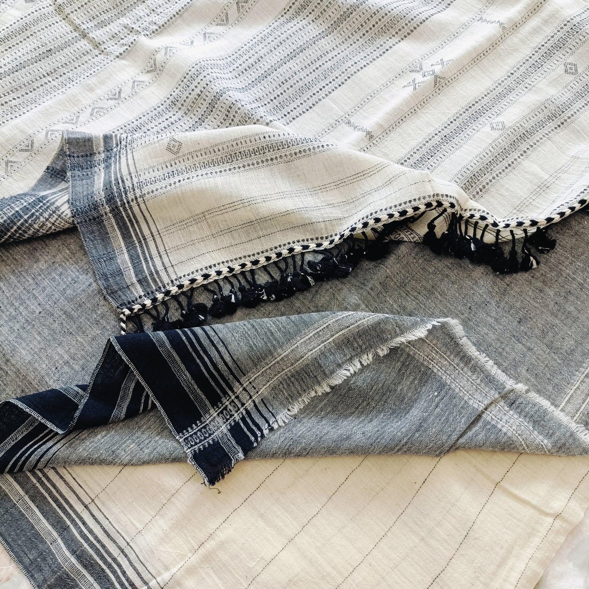 Textile with geometric pattern on a wooden surface