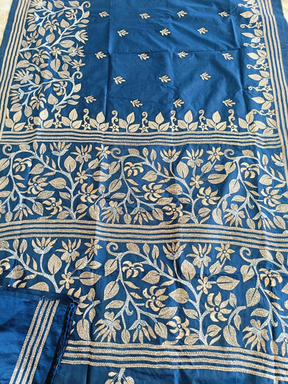 Blue fabric with gold floral patterns