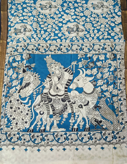 Decorative fabric with intricate black and white patterns on a blue background