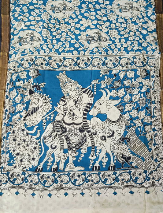Decorative fabric with intricate black and white patterns on a blue background