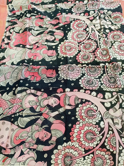 Decorative fabric with intricate patterns of women and flowers on a black background