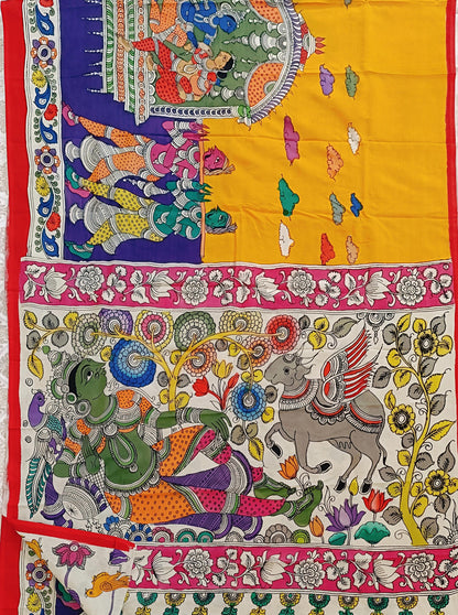Colorful tapestry with intricate designs of animals and patterns on a yellow background